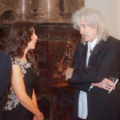 Margaret having a chat about music with the legend Dr Brian May 