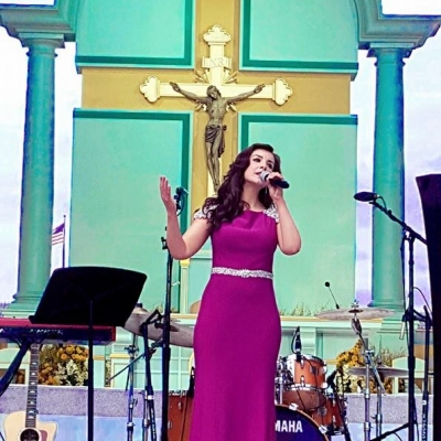Margaret performing at the Pre- Papal concert to an audience of 5million
